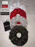 Set of four velvet hair ties in white, red, light grey and dark grey with a tag labeled 'Alternative Touch' on a white background.